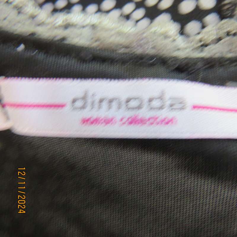 DIMODA Italy sheer black-tiny cream spots sleeveless top Two crossovers at back.Nylon lining.Size 34