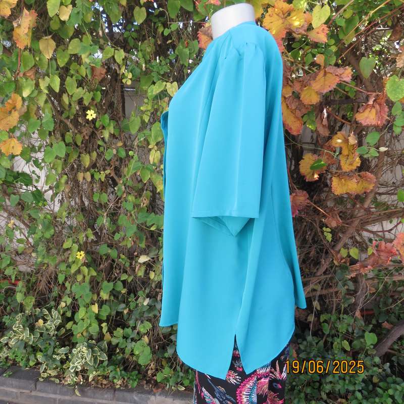 Dark turquoise silky polyester short sleeve button down top. Size 48.