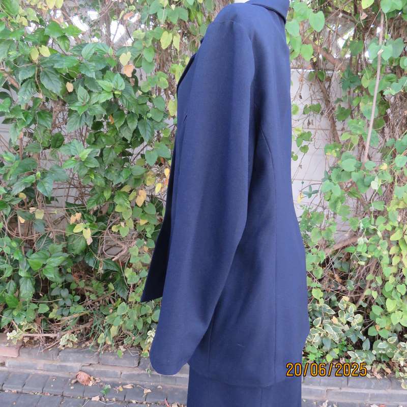 KARISMA  navy 2 pc skirt suit both pieces fully lined. Size 40-16. Tailored jacket.