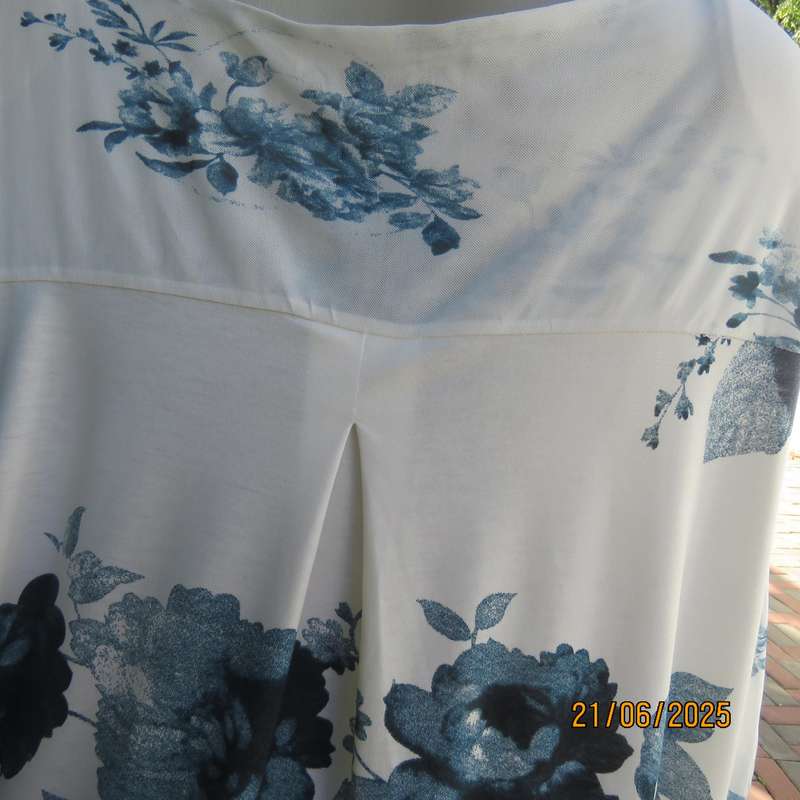 MILADYS white with blue floral print stretch polyester size 52 top. Front sheer overlays