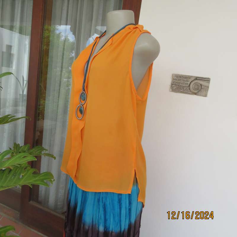 Tangerine cool slip over polyester V front top. Gathered front shoulders. Longer back.Slits.Size 36.