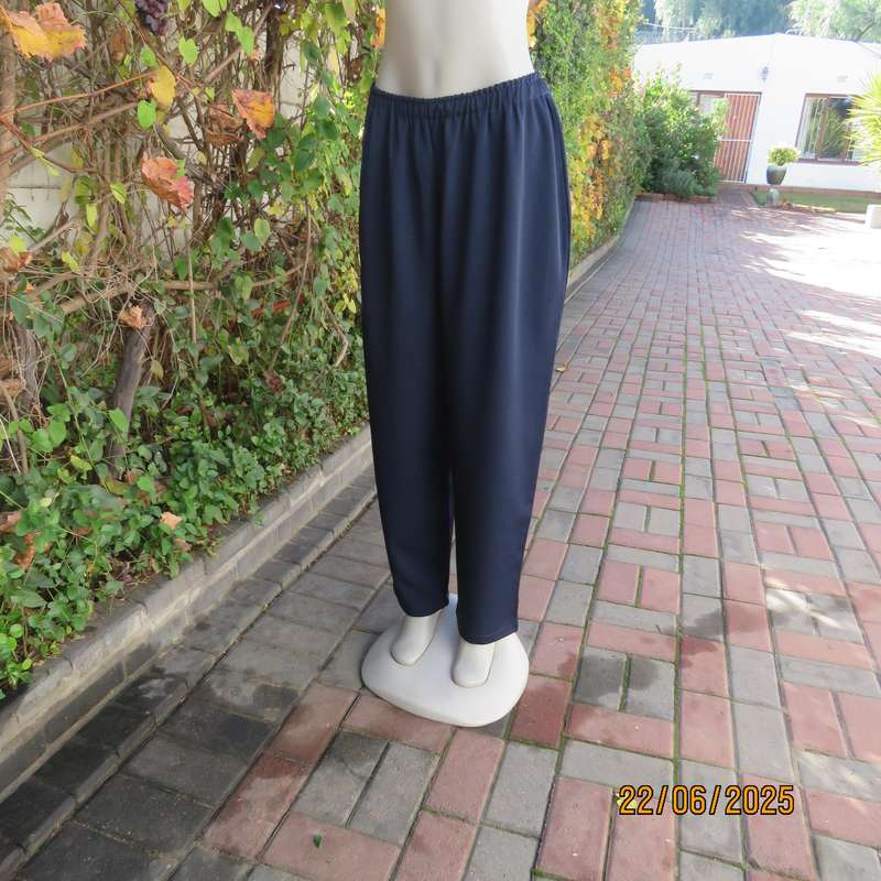 Boutique made navy comfy pant in polyester size 44. Elasticated waist.