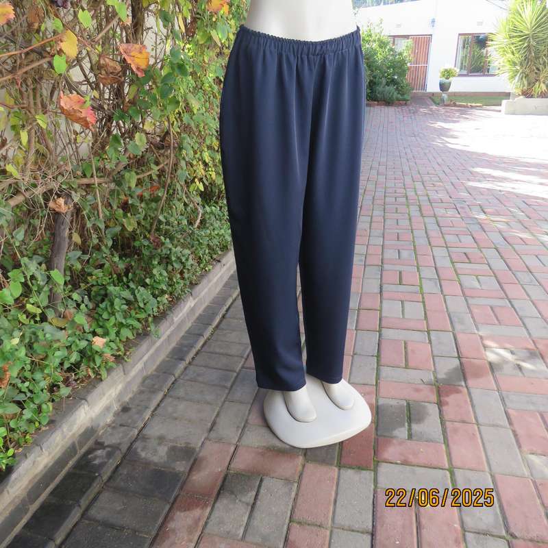 Boutique made navy comfy pant in polyester size 44. Elasticated waist.