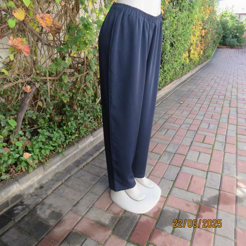 Boutique made navy comfy pant in polyester size 44. Elasticated waist.