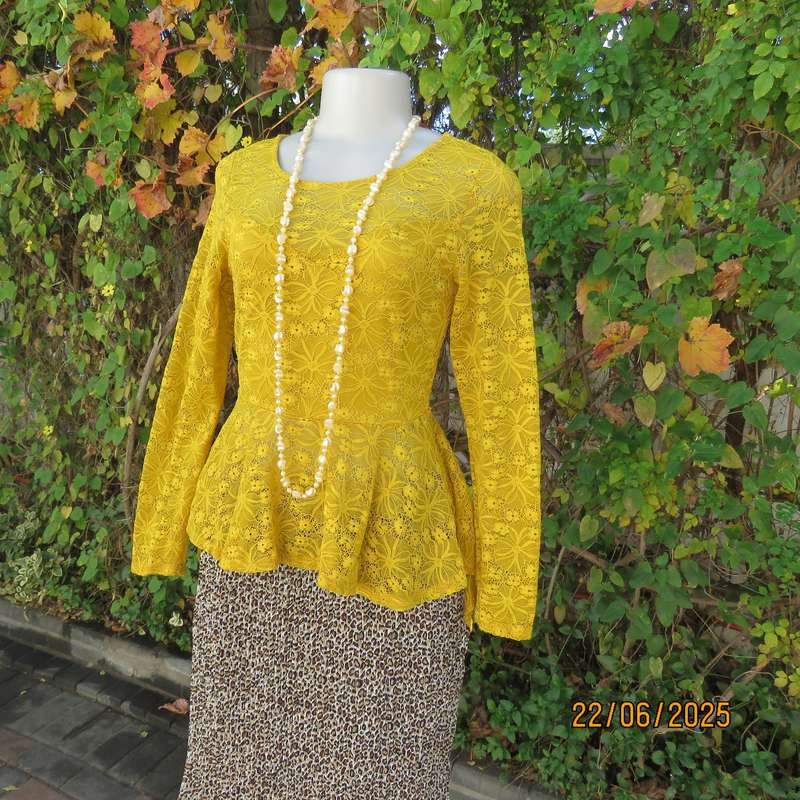 NEW FEELING mustard stretch polyester lace peplum top. Size 32. Long sleeves.