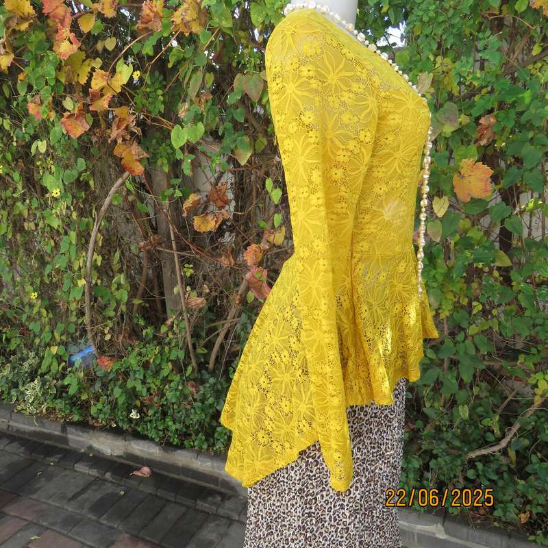 NEW FEELING mustard stretch polyester lace peplum top. Size 32. Long sleeves.