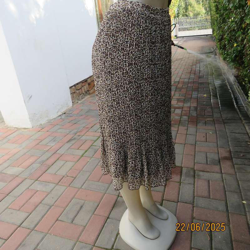 Animal print permanent pleated skirt with brown stretch polyester inner layer. Size 46