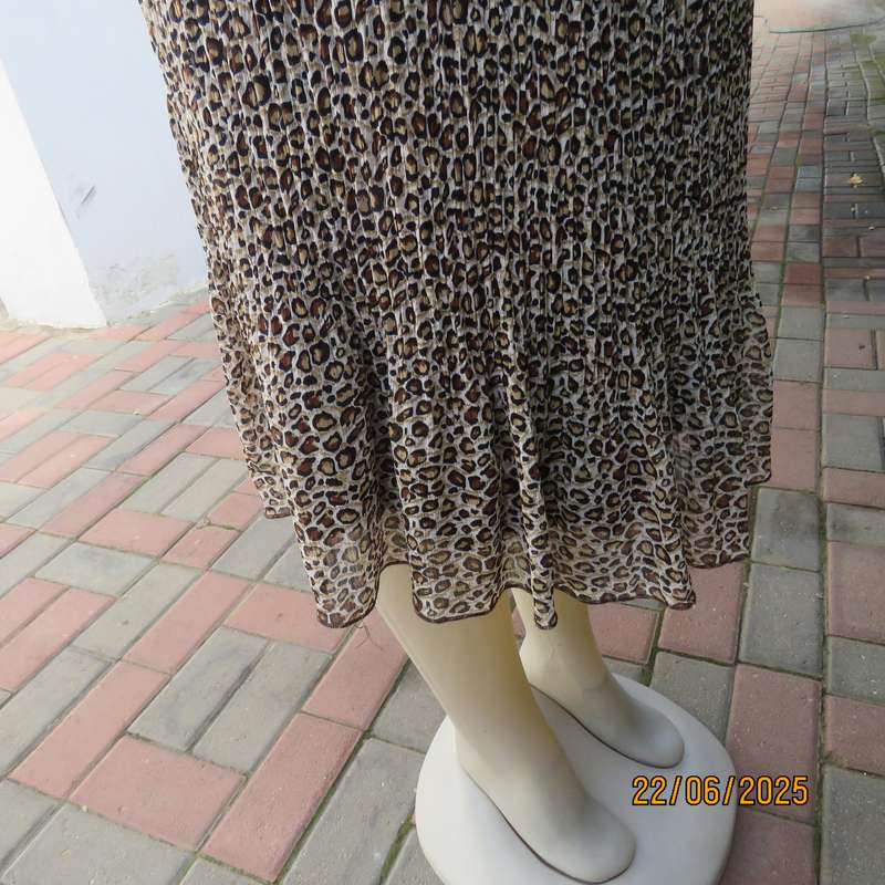 Animal print permanent pleated skirt with brown stretch polyester inner layer. Size 46