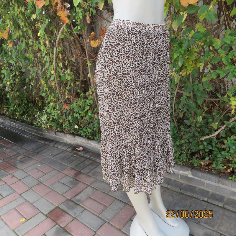 Animal print permanent pleated skirt with brown stretch polyester inner layer. Size 46
