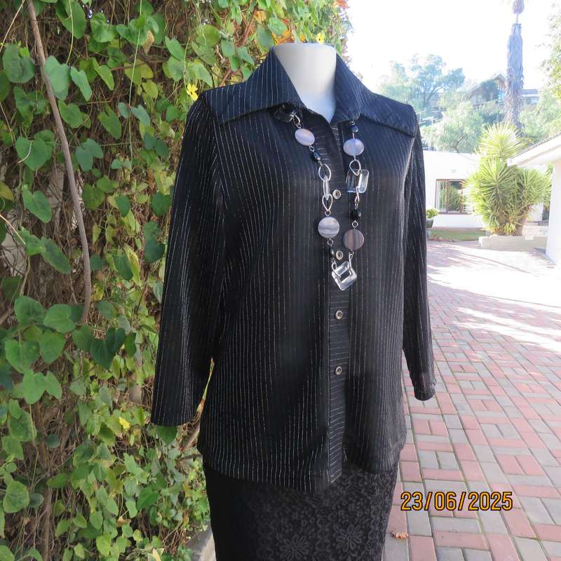 CARO smart casual black stretch polyester top with silver vertical stripes. Size 40
