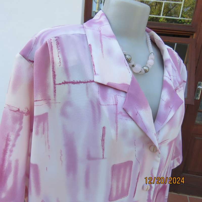 Boutique made button down short sleeve open collar top. Pleated yokes.Size 50 Pink print.