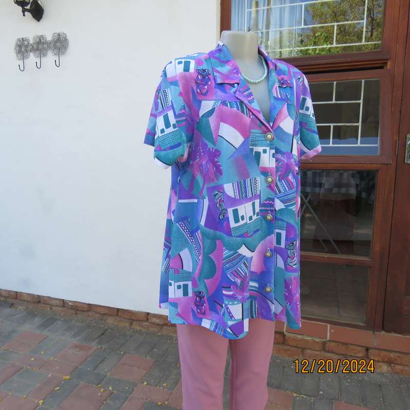 PEPITA high quality size 40 colouful button down-open collar top.Yokes into short sleeves. As new.