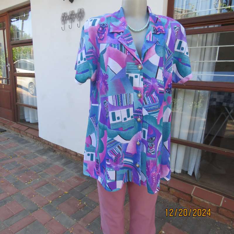 PEPITA high quality size 40 colouful button down-open collar top.Yokes into short sleeves. As new.