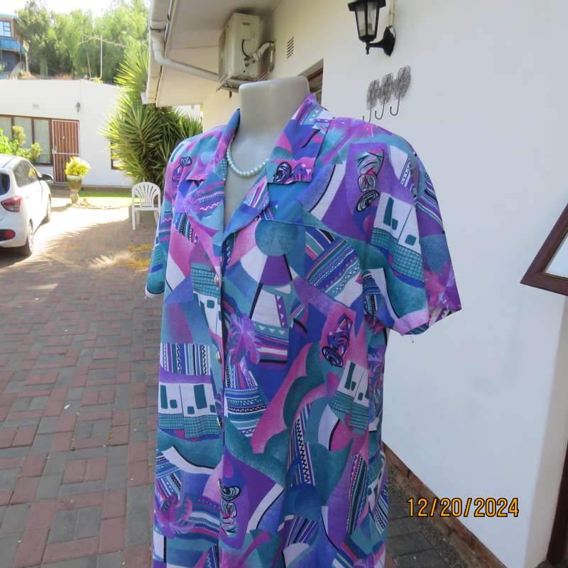 PEPITA high quality size 40 colouful button down-open collar top.Yokes into short sleeves. As new.