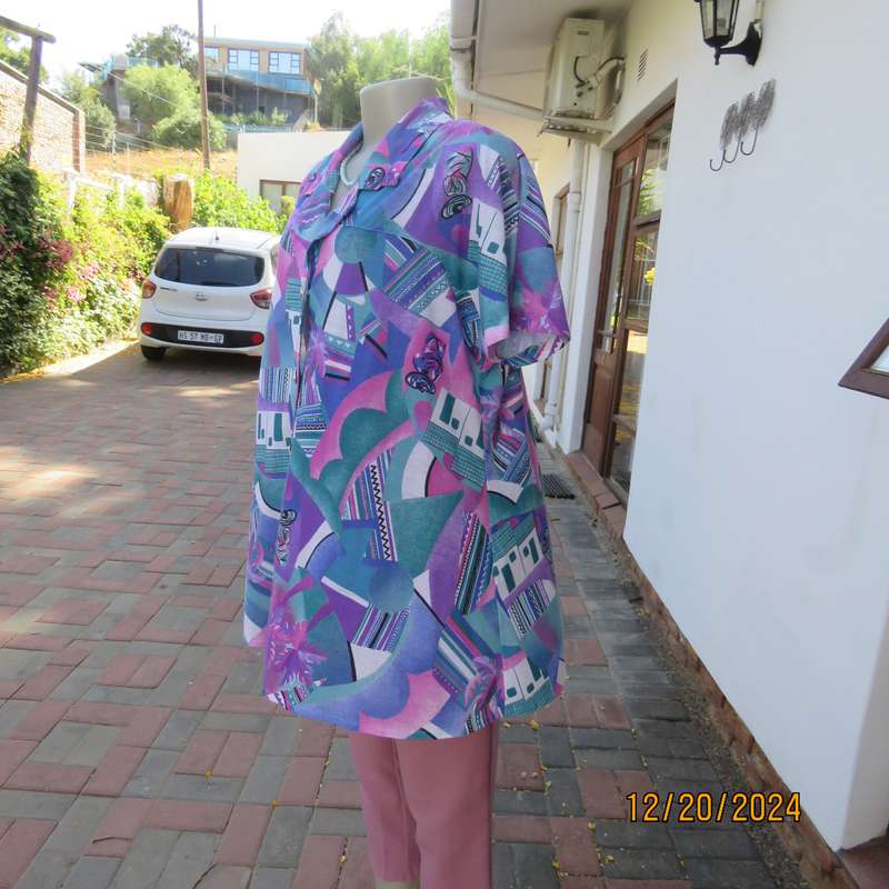 PEPITA high quality size 40 colouful button down-open collar top.Yokes into short sleeves. As new.
