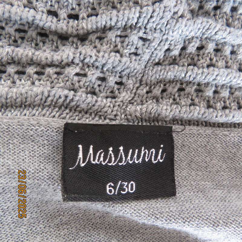 Silver open front polyester-lurex knit cover up size 30. Loose knit al around collar.