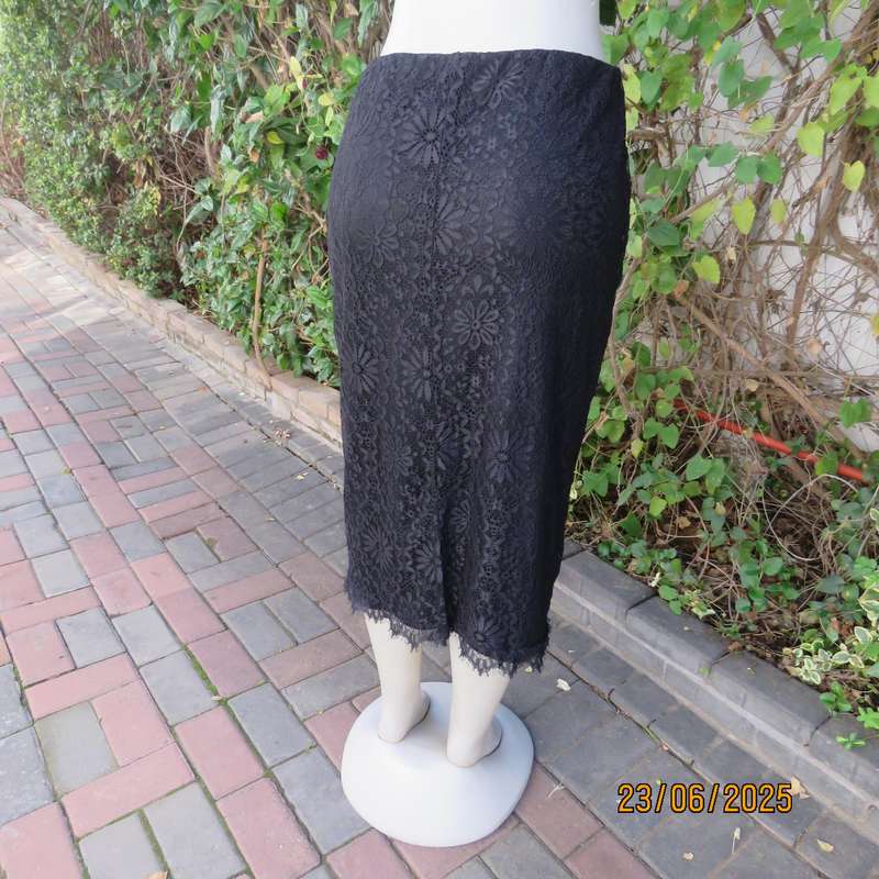 Black bandless acrylic lace pencil skirt-stretch polyester underlay. Size 36