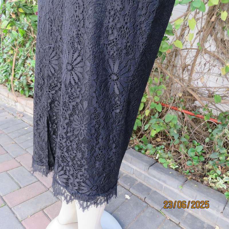 Black bandless acrylic lace pencil skirt-stretch polyester underlay. Size 36