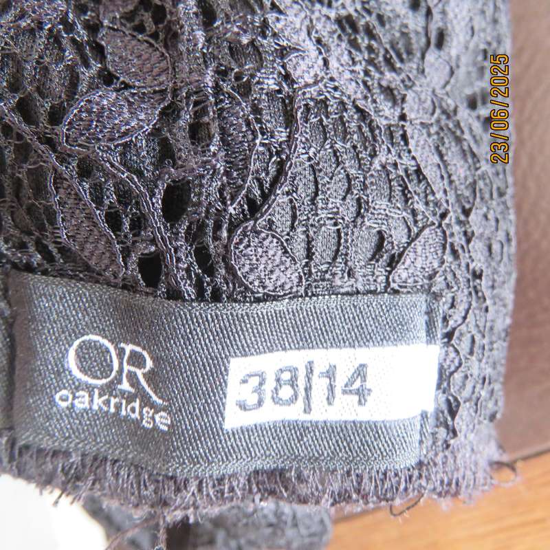 Black bandless acrylic lace pencil skirt-stretch polyester underlay. Size 36