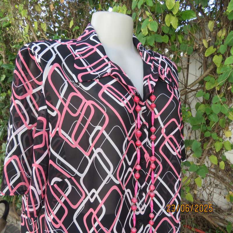 ANNA PIA black sheer polyester sheer polyester top with pink-white link print. Size large 44