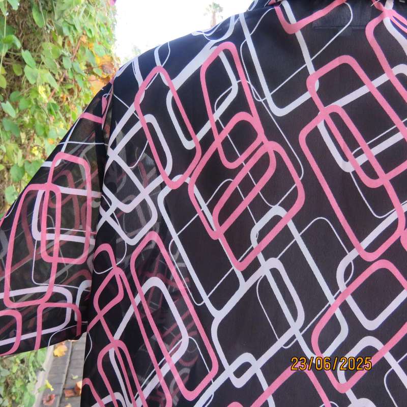 ANNA PIA black sheer polyester sheer polyester top with pink-white link print. Size large 44