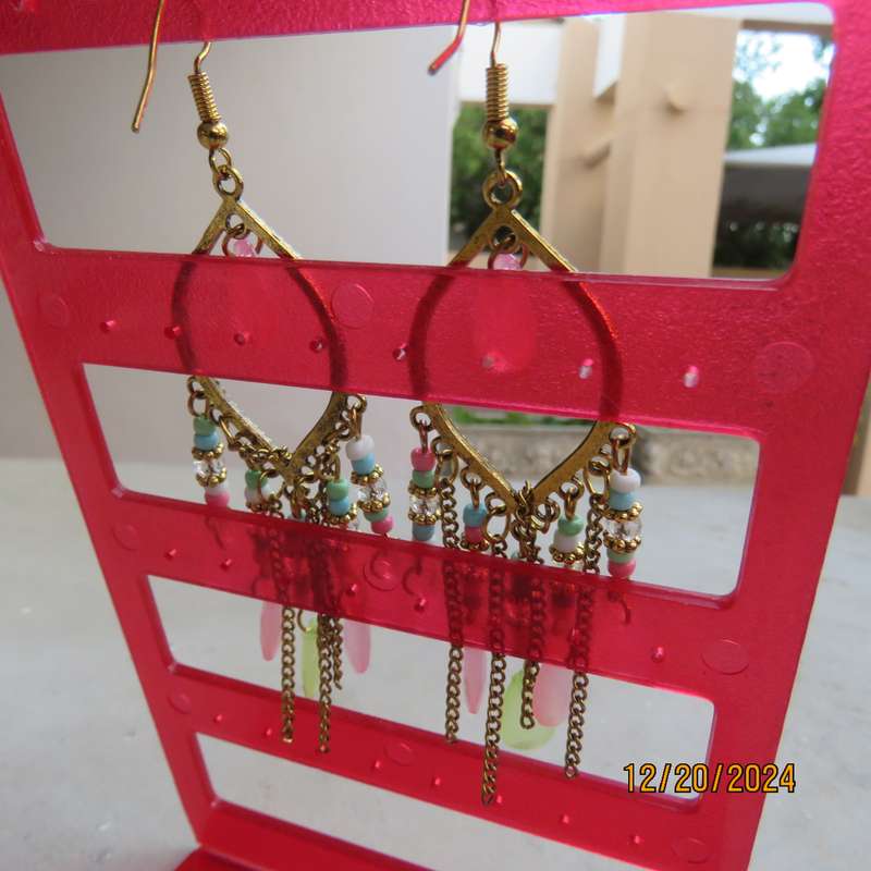 Pair colourful chandelier earrings with golden oval ring- beads and chains hanging. New item.