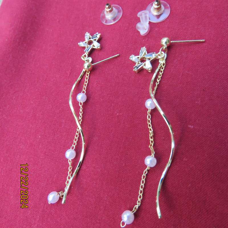 Pair of dainty golden long hanging earrings with thin chain with faux pearls. New item