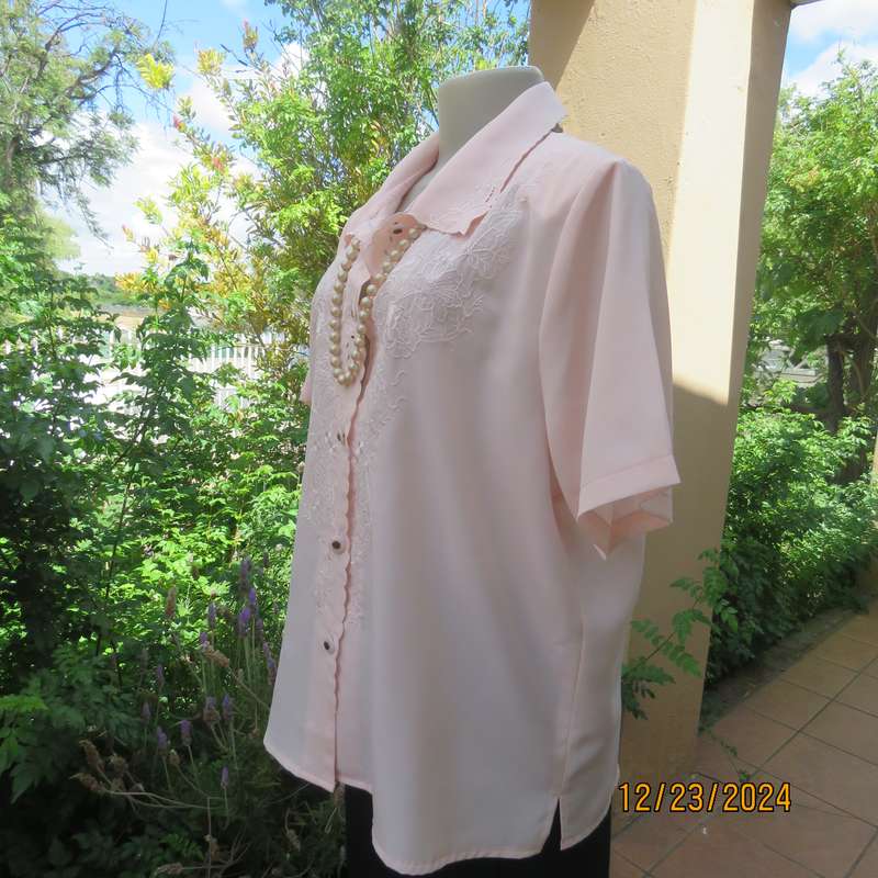 Richly embroidered soft apricot colour button down silky polyester top.Shirt collar.Size 40 .As new