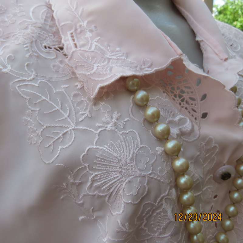 Richly embroidered soft apricot colour button down silky polyester top.Shirt collar.Size 40 .As new