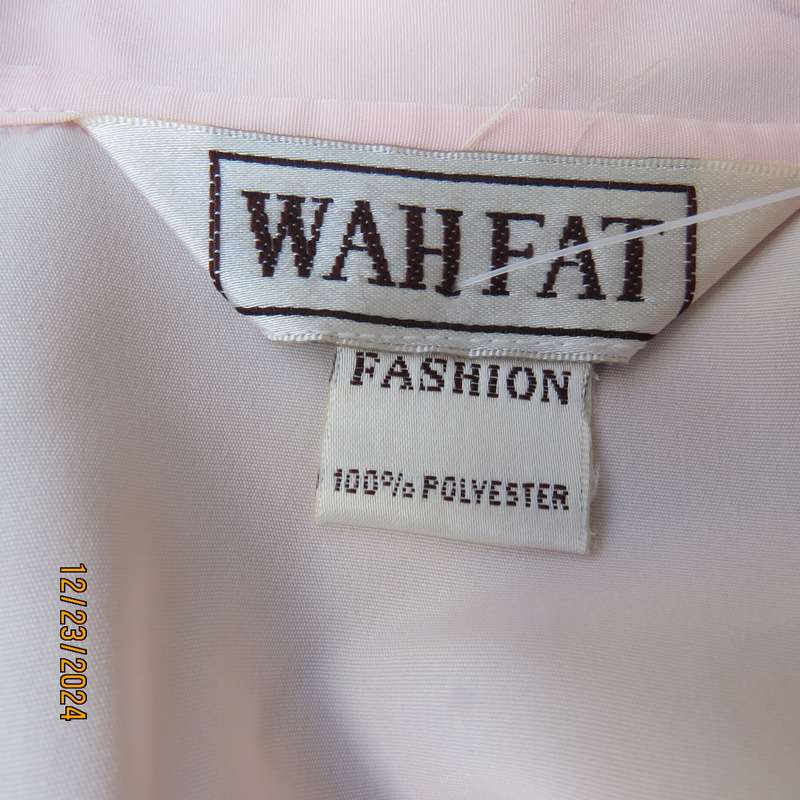 Richly embroidered soft apricot colour button down silky polyester top.Shirt collar.Size 40 .As new