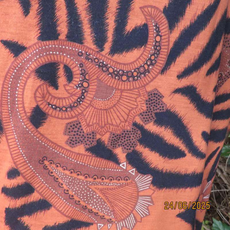 Burnt orange-black bohemian print long open front top. Kimono style sleeves. Size 44