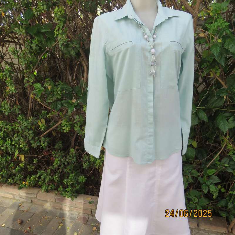 WOOLWORTHS mint green long sleeve cotton shirt size 34. Unique front pockets.