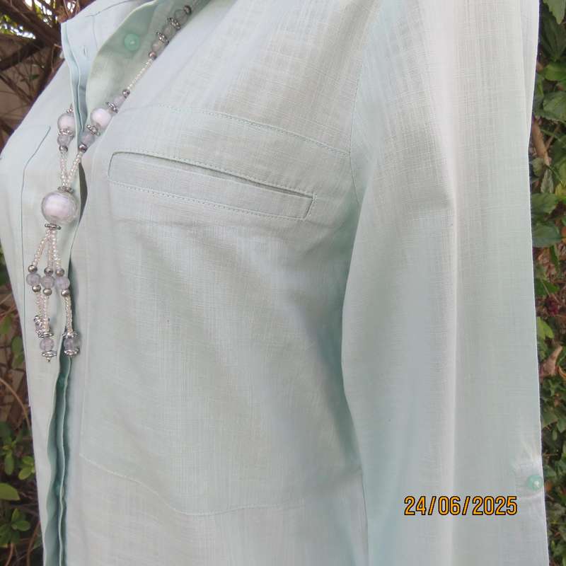 WOOLWORTHS mint green long sleeve cotton shirt size 34. Unique front pockets.