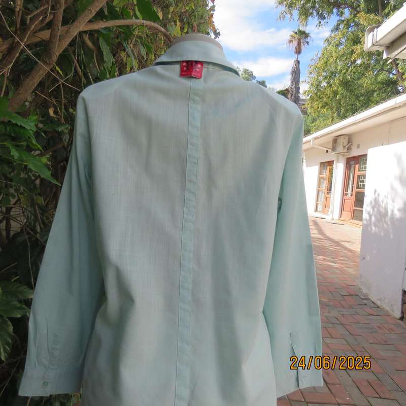 WOOLWORTHS mint green long sleeve cotton shirt size 34. Unique front pockets.