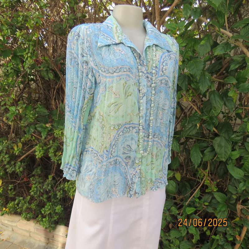 Soft blue-green permanent pleated paisley printed polyester top. Size 38.
