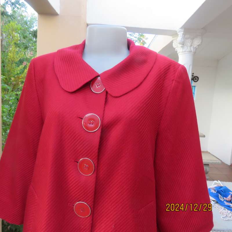High quality red LTD Woman fly away short jacket in ribbed acrylic.Fully lined. Size 38. As new.