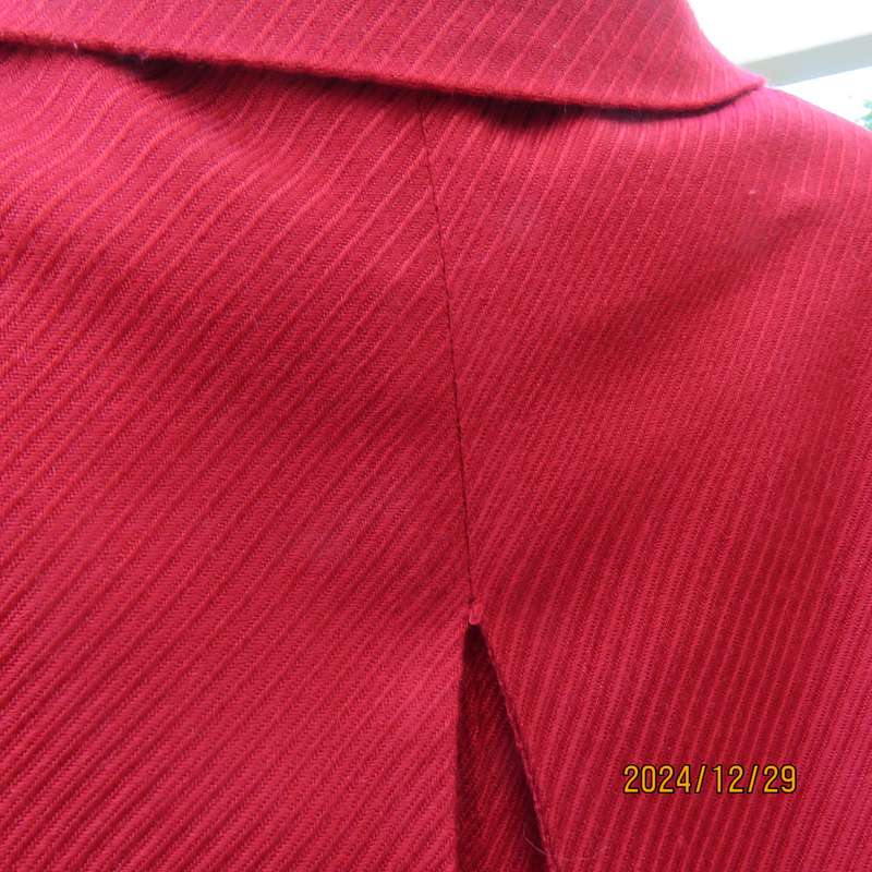 High quality red LTD Woman fly away short jacket in ribbed acrylic.Fully lined. Size 38. As new.