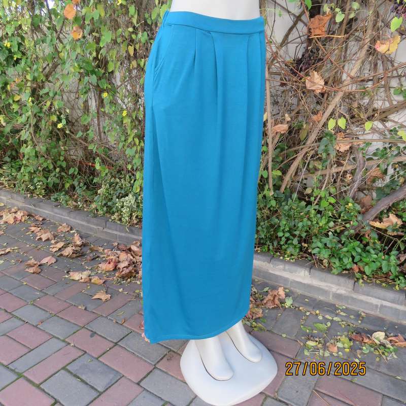 Maxi jade stretch polyester skirt size 34. Pleats on front. Elasticated waist back.