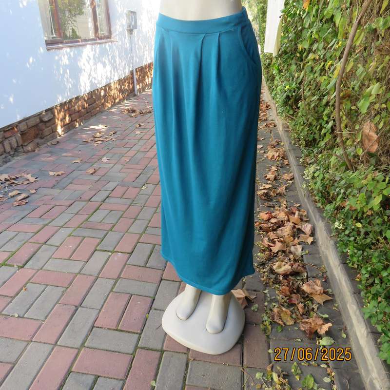 Maxi jade stretch polyester skirt size 34. Pleats on front. Elasticated waist back.