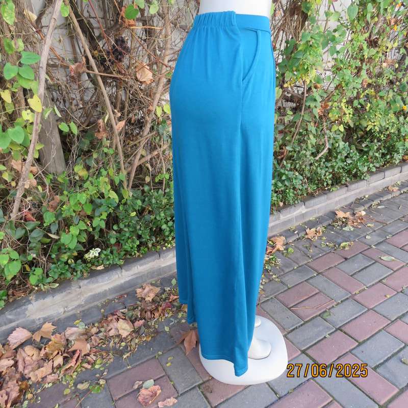 Maxi jade stretch polyester skirt size 34. Pleats on front. Elasticated waist back.
