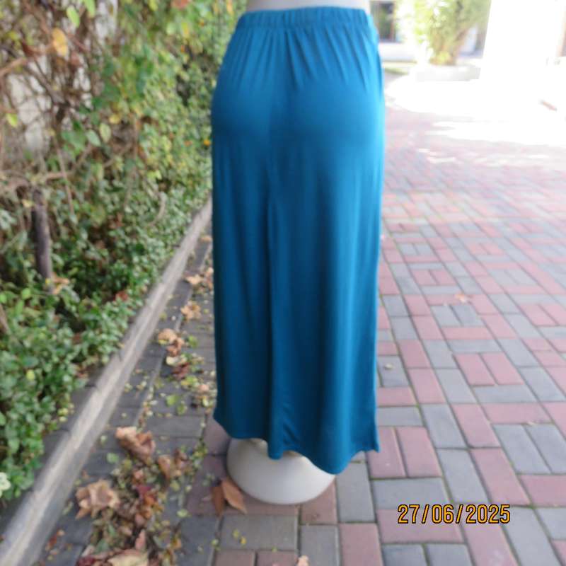 Maxi jade stretch polyester skirt size 34. Pleats on front. Elasticated waist back.