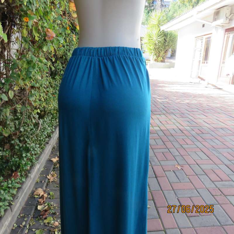 Maxi jade stretch polyester skirt size 34. Pleats on front. Elasticated waist back.