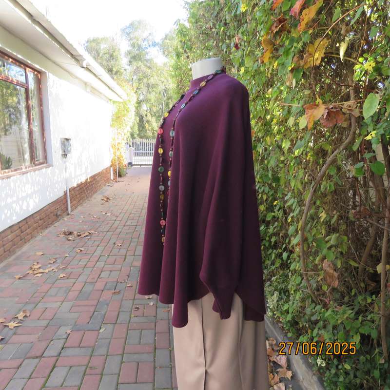 PENNY C dark plum crew neck poncho with cut on elbow sleeves. Size 38-44.