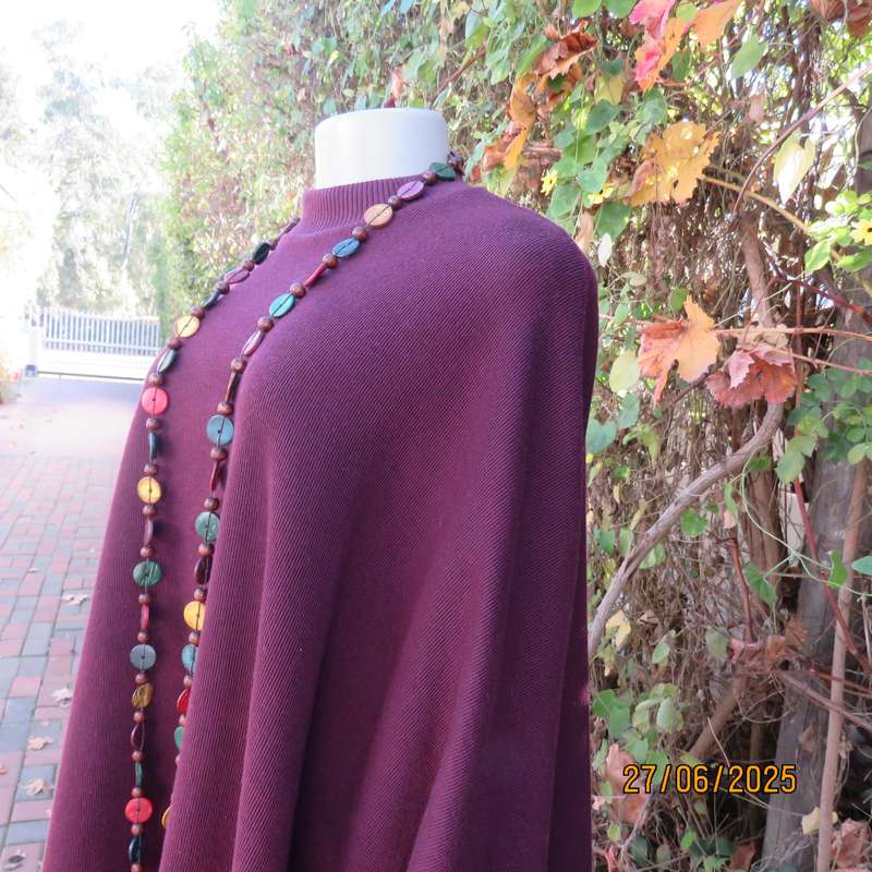 PENNY C dark plum crew neck poncho with cut on elbow sleeves. Size 38-44.