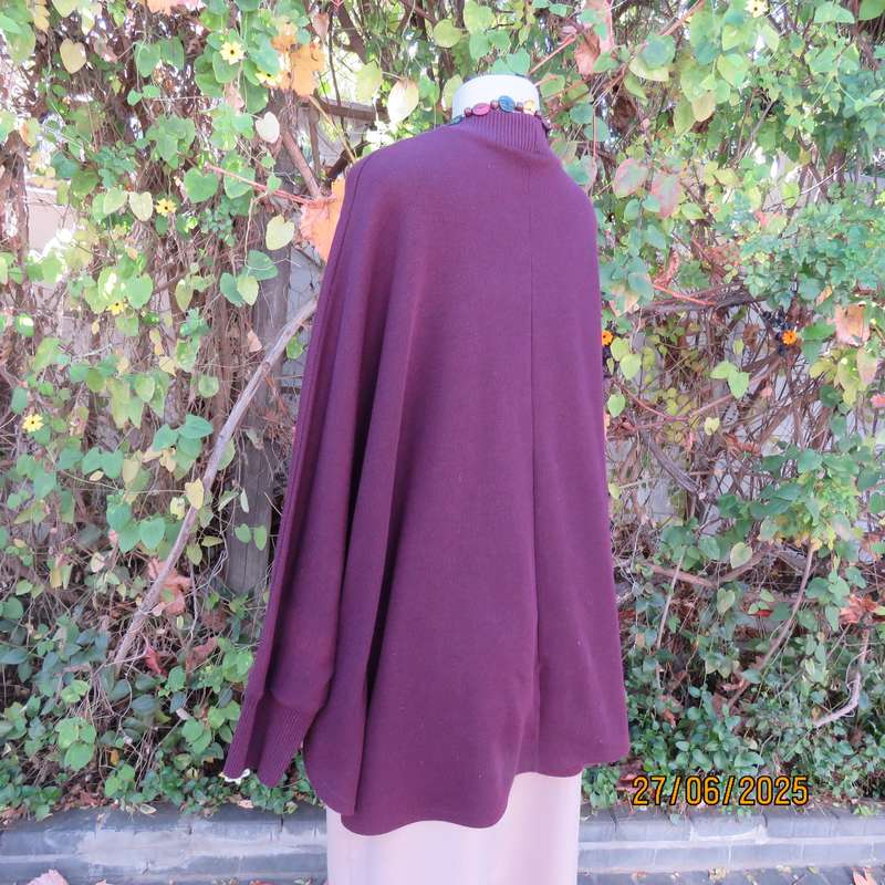 PENNY C dark plum crew neck poncho with cut on elbow sleeves. Size 38-44.