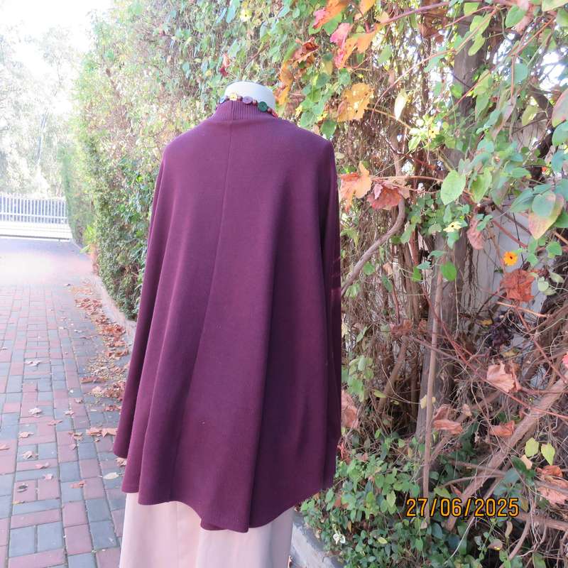 PENNY C dark plum crew neck poncho with cut on elbow sleeves. Size 38-44.