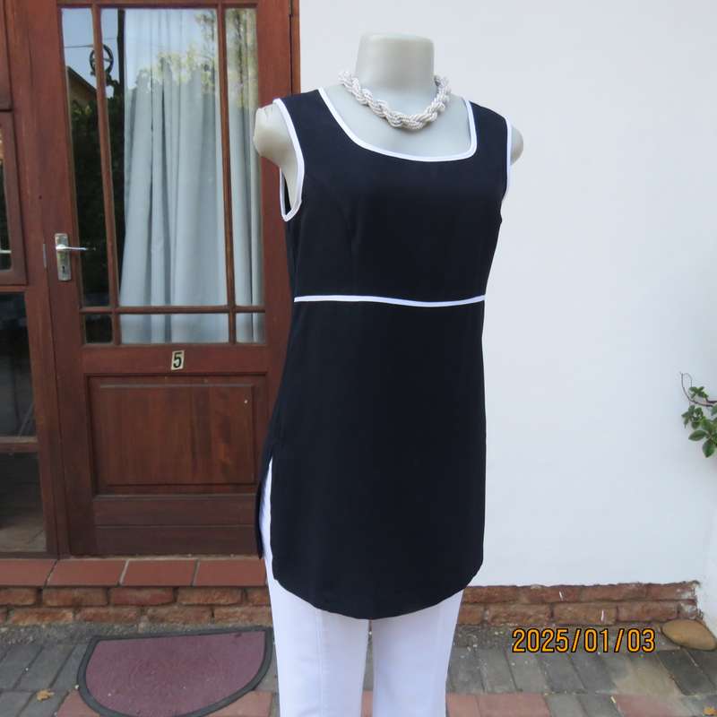 Elegant dark navy empire style sleeveless TRUWORTHS long top. White edging. Back zip, Size 34.As new