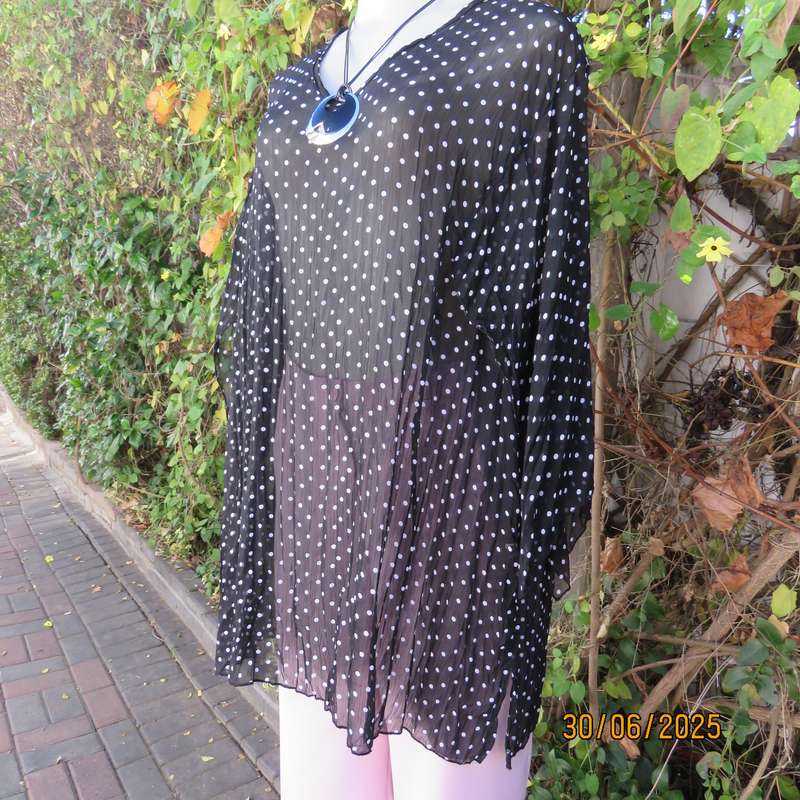 DONNA CLAIRE sheer black-white polkadot pleated top. Size 48. Open elbow sleeves.