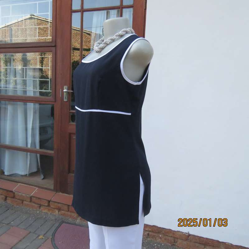 Elegant dark navy empire style sleeveless TRUWORTHS long top. White edging. Back zip, Size 34.As new