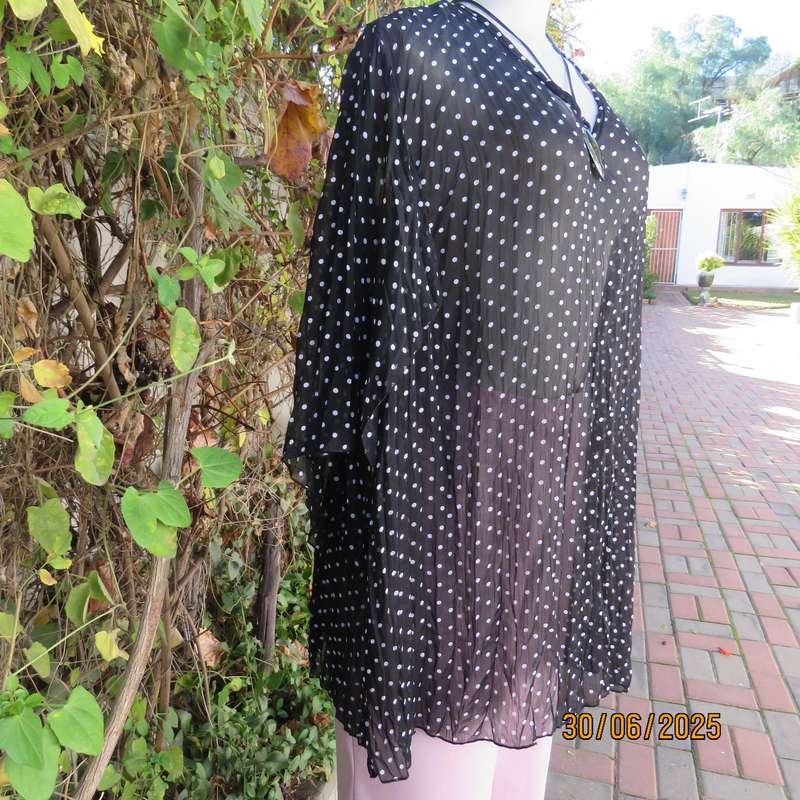 DONNA CLAIRE sheer black-white polkadot pleated top. Size 48. Open elbow sleeves.